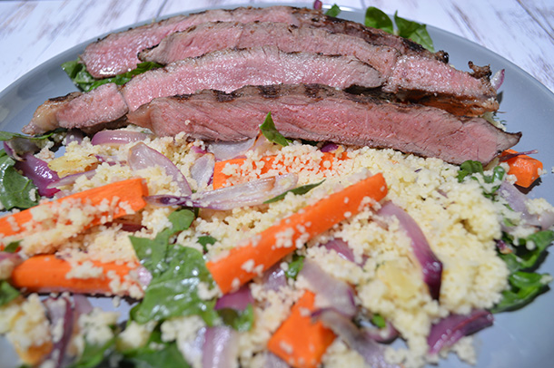 Grilled beef with carrot and couscous salad
